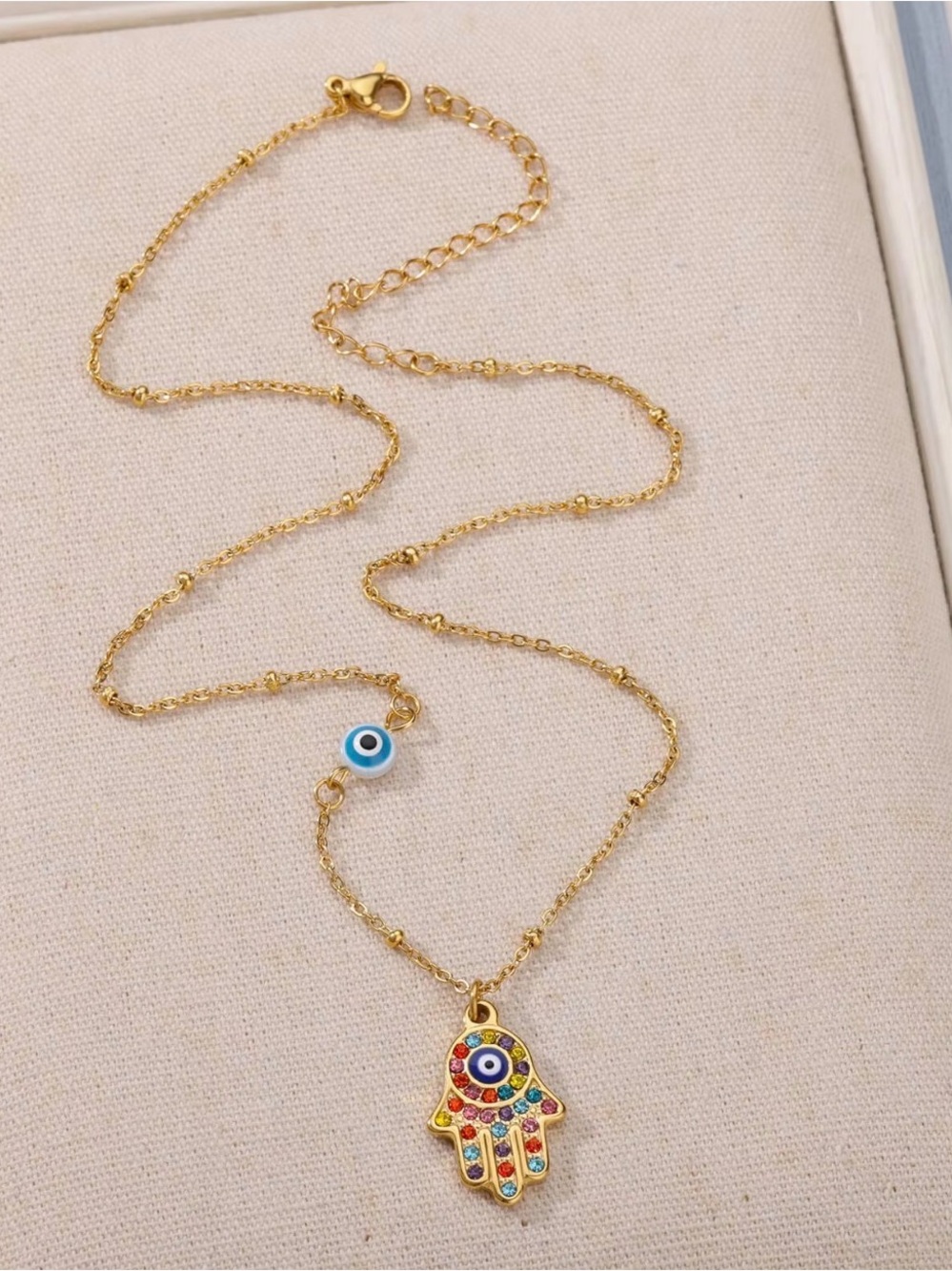 Gold Hamsa Hand Necklace with Multicolor Stones and Blue Eye